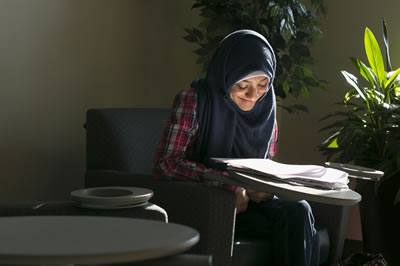 Student studying at a table